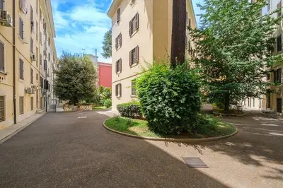 an empty street in the middle of a building at ht la spezia bilo in Rome