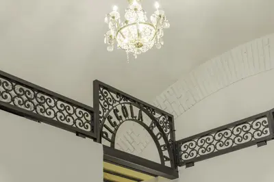 a chandelier hanging from a ceiling in a room at Pantheon Apartments - Piccola Roma in Rome