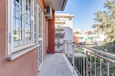 a balcony with a view of a city at HYRIA Holiday Home in Rome