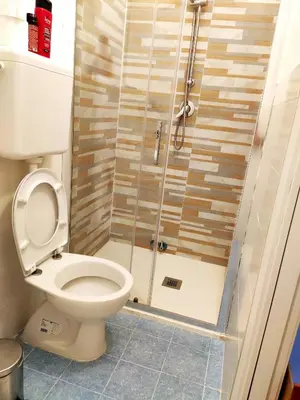a bathroom with a toilet and a shower at Sina Rent Room Flaminio in Rome