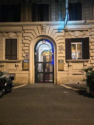 an entrance to a building with an arch doorway at Check in Rome in Rome