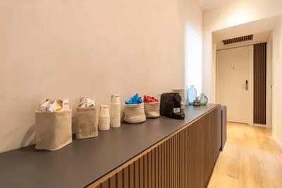 a row of bags sitting on top of a counter at Cunabu Urbano V in Rome