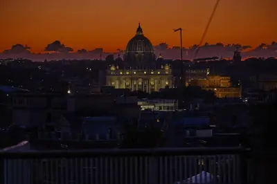 a view of the capitol building at sunset at Panoramic Quirinal Penthouse in Rome