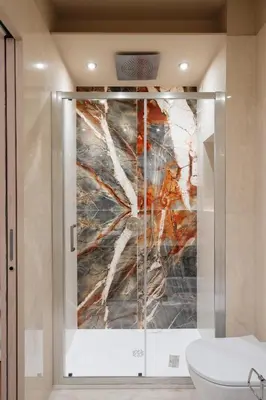 a bathroom with a painting on the wall at Firenze Boutique Rooms in Rome