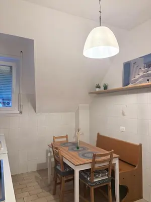 a bathroom with a shower and a toilet and a sink at Lux Apartment Tuscolano in Rome