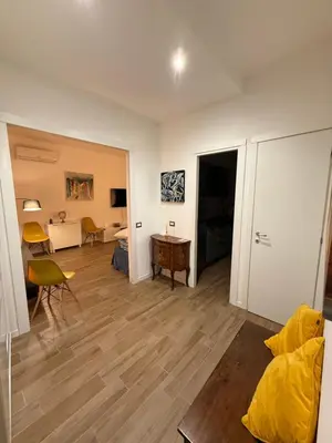 a living room with a bed and a room with a desk at Rosetta Lovely House - Pantheon - Roma in Rome