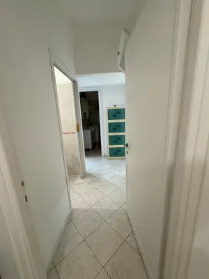 a hallway with a door leading to a room at Silihome, Trastevere, Piazza della Radio in Rome