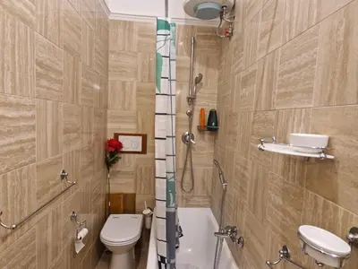 a bathroom with a shower and a toilet and a sink at Simple life in Rome in Rome