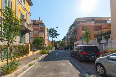 a car parked on the side of a street at Rétro Chic Circo Massimo in Rome