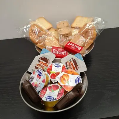 a bowl of food with sandwiches and other snacks at Bemy in Rome
