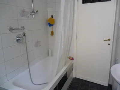 a bathroom with a shower and a tub and a sink at B&B all'ombra del Vaticano in Rome