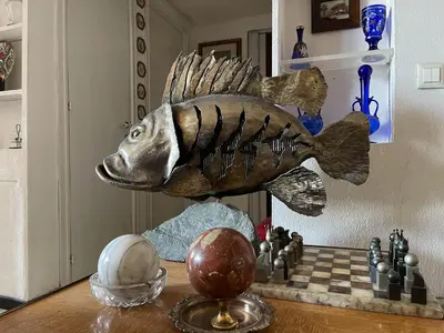 a statue of a fish on a chess board at Casa di Alfredo -Appartamento Musei Vaticani in Rome