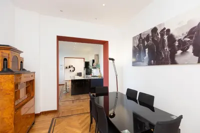 a living room with a television and a picture on the wall at Ripa by Rental in Rome in Rome