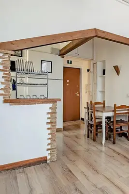 a kitchen and dining room with a table and chairs at Apartment B4 in the center of Rome WiFi and AC in Rome