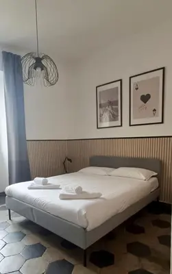 a bedroom with a bed with two towels on it at Apartment B4 in the center of Rome WiFi and AC in Rome