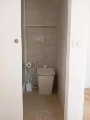 a small bathroom with a toilet in a room at San Cosimato cozy flat in Rome