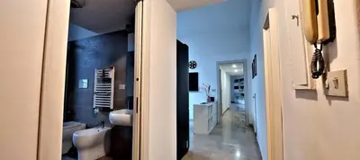 a bathroom with a sink and a toilet in a room at Casa Linda in Rome