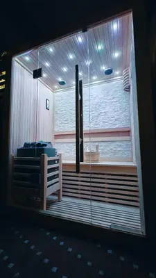 a room with a large window with a bed in it at Olive Whisper Rome Garden and Sauna in Rome