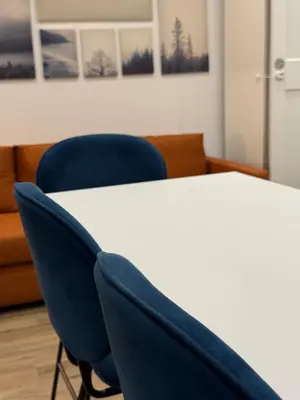 a living room with a couch and a table at Scipioni Relais in Rome
