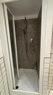 a shower with a glass door in a bathroom at Valentina Suite Colosseo in Rome