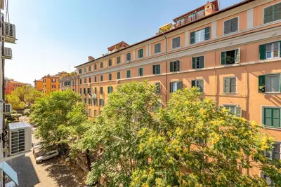 a large building with trees in front of it at Casa Maria al Flaminio in Rome