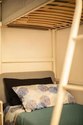 a bedroom with a bunk bed with a pillow at Casa Broccoletti in Rome