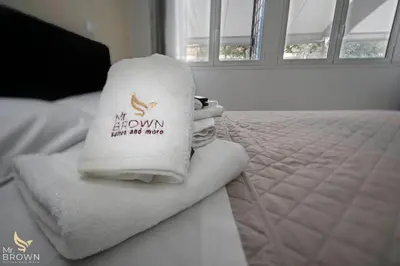 a pile of towels sitting on top of a bed at Garden and Relax in Rome