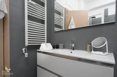 a bathroom with a sink and a mirror at Garden and Relax in Rome