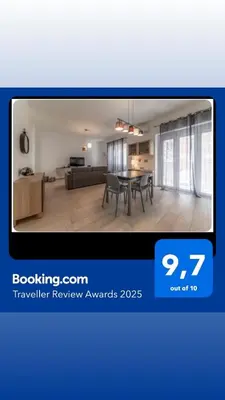a picture of a living room and a dining room at Holiday Home in Rome