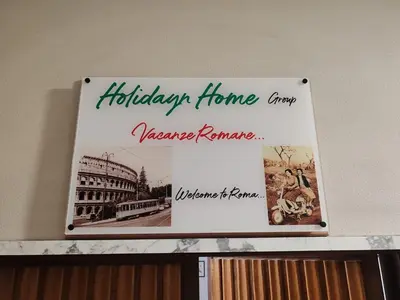 a sign that says holiday home improve mortgage insurance at Holiday Home in Rome