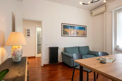 a living room with a couch and a table at Carpegna Park Apartment by Cornelia subway in Rome