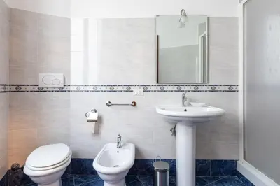 a bedroom with a bed and a window at Elegant Salandra Suite in Rome