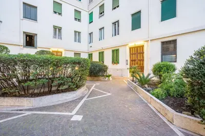 an empty parking lot in front of a building at Charme & Luxe 2 bedroom apartment City Center in Rome