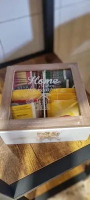 a wooden box filled with books on a table at Barbara Sweet Home - Appartamento Intero in Rome