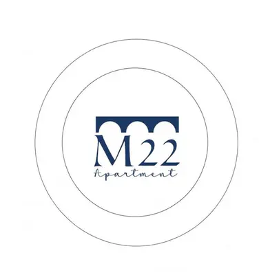 a logo for a manufacturing company with two clouds at Milvio22 Apartment in Rome