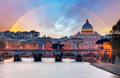 a view of a city with a bridge and a rainbow at B&D Dolce Vita in Rome