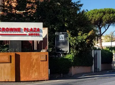 a sign for a homearma pizza world on the side of a street at Venus Inn Casa Vacanze AURELIA ANTICA in Rome