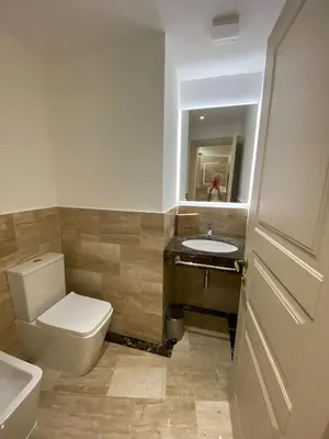 a bathroom with a toilet and a sink and a mirror at Cozy Luxury Room Pantheon in Rome