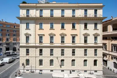 a large building with a tower on top of it at Sant'Angelo Terrace Apartment in Rome