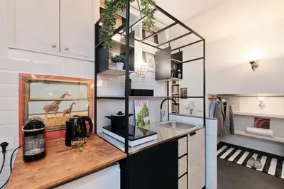 a kitchen with a counter and a sink at Casa Calligarich Stadio Olimpico Foro Italico in Rome
