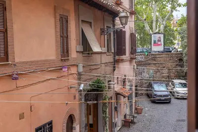 a building with lots of wires attached to it at iFlat Modern & Comfortable apt in Trastevere in Rome