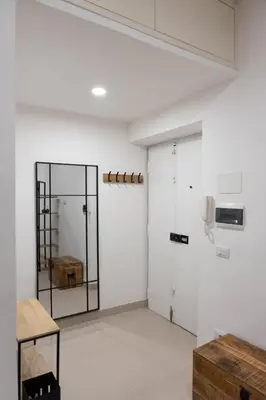a room with white walls and a glass door at When in Rome in Rome