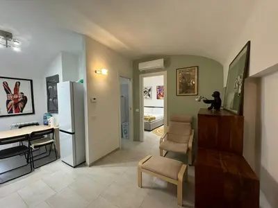 a living room with a desk and a chair at Quiet Corner in the Eternal City in Rome