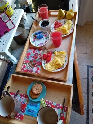 a breakfast table with two trays of food on it at Bed & Breakfast da Monica in Rome