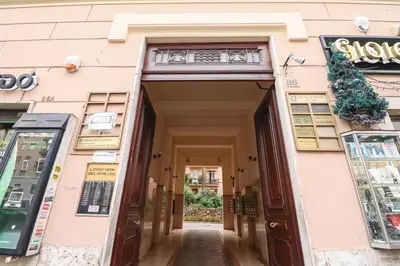an entrance to a store with the door open at Re Di Rhome Guest House in Rome