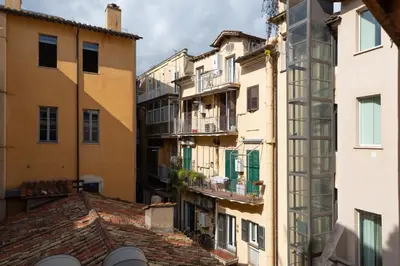 an apartment building with balconies and roofs at iFlat Trevi's Paradise in Rome
