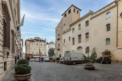 a city street with a white van parked next to buildings at Dimora Capo di Ferro in Rome
