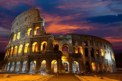 a building that is lit up at night at May Home Guest House in Rome
