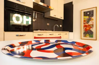 a colorful plate on a table in a kitchen at ColoRHome in Rome