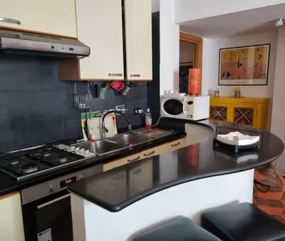 a kitchen with a sink and a counter top at Casa BiBi in Rome